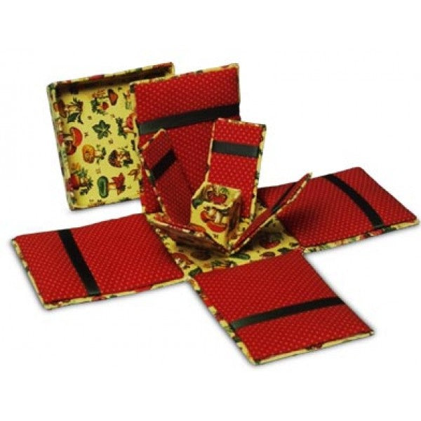 A set of red and yellow patterned fabric coasters with black stripes, shown both folded and unfolded on a white background.