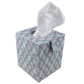 Tissue box with a floral pattern on a white background.